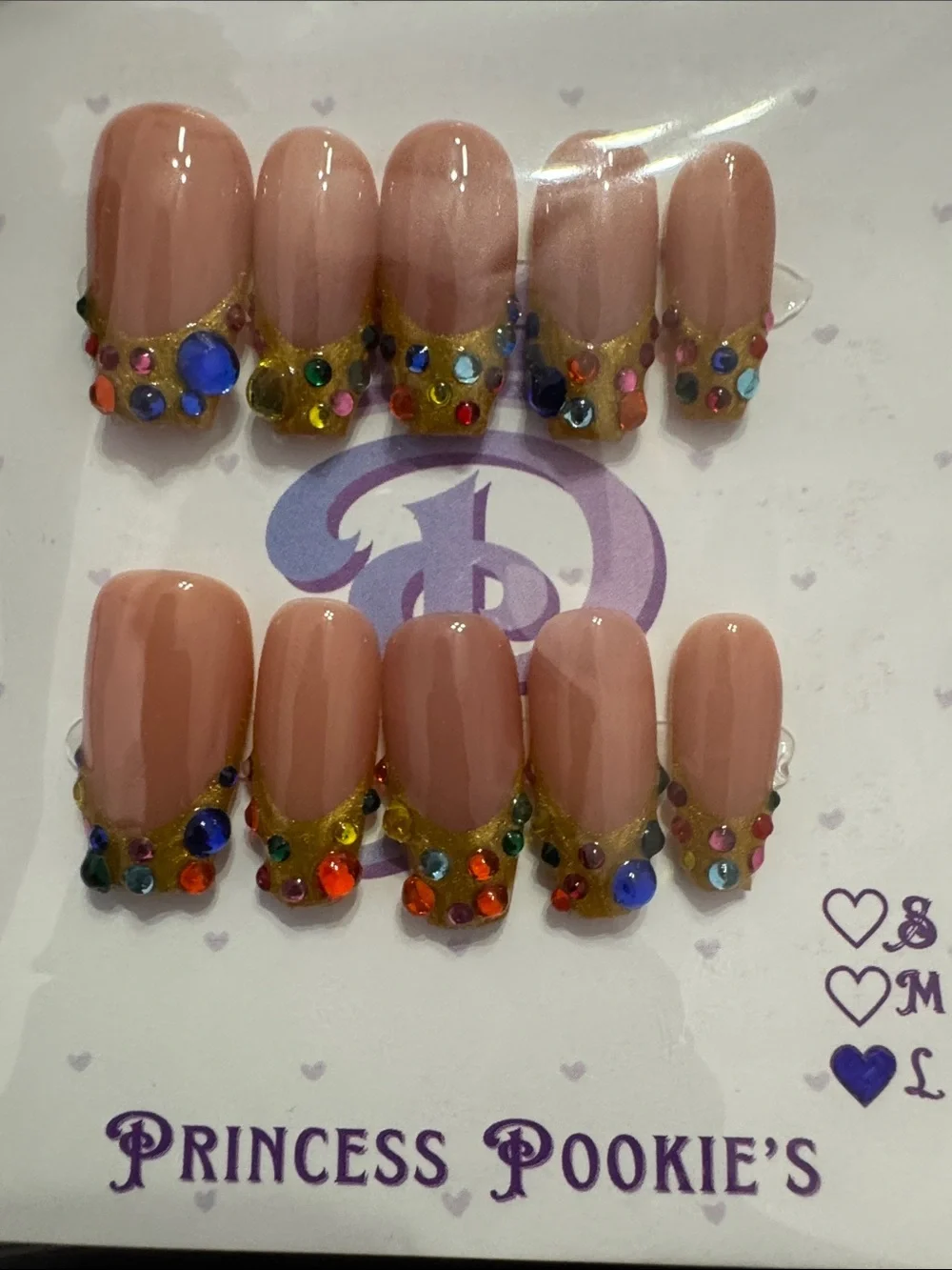 Nude Pink Press-On Nails with Gold French Tip and Multicolor Rhinestones